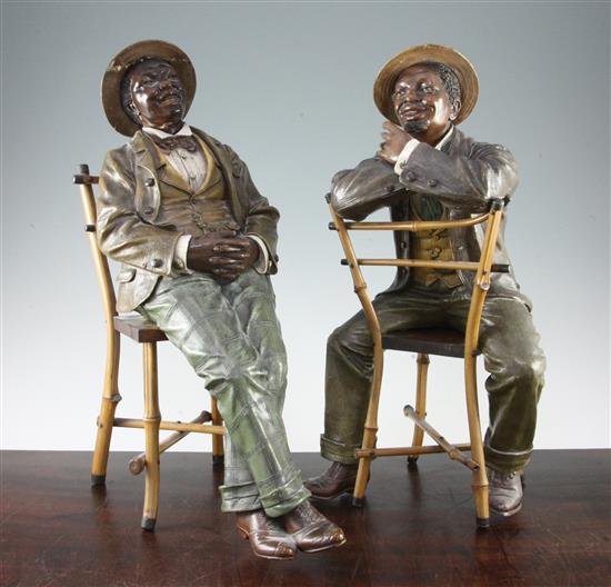 A pair of Johann Maresch Austrian painted terracotta figures, largest 18in., some damages